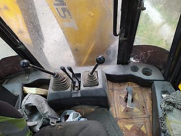 mtz 82 4x4: MST ekskavator-yükləyici (backhoe loader) - Marka/model: MST M5 — 9