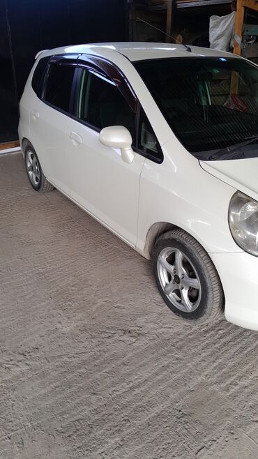 руль на приору: Honda Fit: 2010 г., Хетчбек