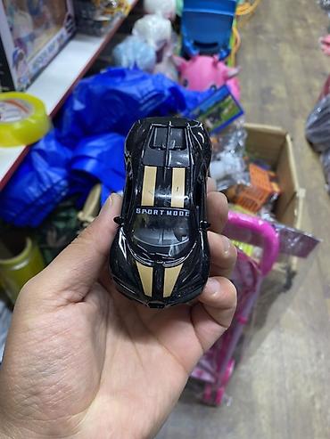 mini gt: Игрушечная машинка в виде спортивного автомобиля. Выполнена в черном — 2