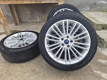 фургоны категории б: Ford üçün orijinal yüngül lehimli disklər və təkər komplekti - — 2