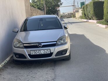 Opel: Opel Astra H – 5 qapılı hetçbek, gümüşü rəng. - Kuzov: kompakt — 9