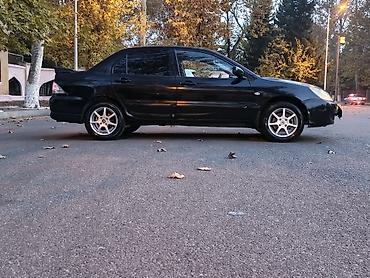 w202 qapı: Mitsubishi Lancer: 1.6 l | 2005 il 290000 km Sedan — 2