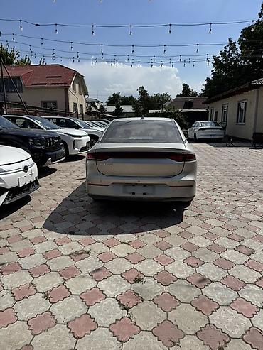 gak aion: Электромобиль Айон С GAC Aion S, серый седан/лифтбек. Кузов и дизайн — 3