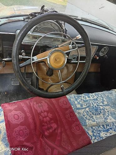 avtomobilin on şuşəsi: GAZ-21 “Volqa” klassik sedan - Korpus: 4 qapılı, xrom ön-arka — 1
