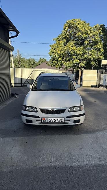 мото зонтик: Mazda Capella: 1999 г., Универсал — 1