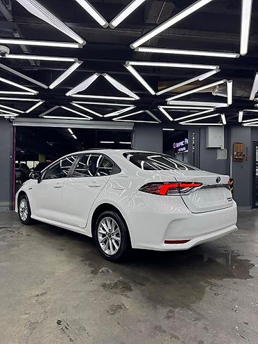 voxy noah: Toyota Corolla: 2022 г., 1.8 л, Автомат, Гибрид, Седан — 5