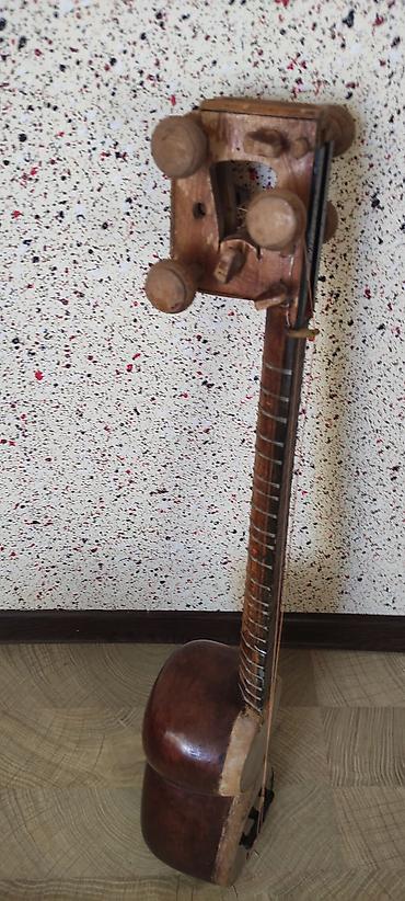 tar kaman qaval: Məhsul: Tar (xalq simli musiqi aləti).Evde usaqindir illərin — 4
