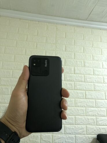 мини телефон: Xiaomi Redmi smartfon - Rəng: qara - Arxa paneldə Redmi loqolu