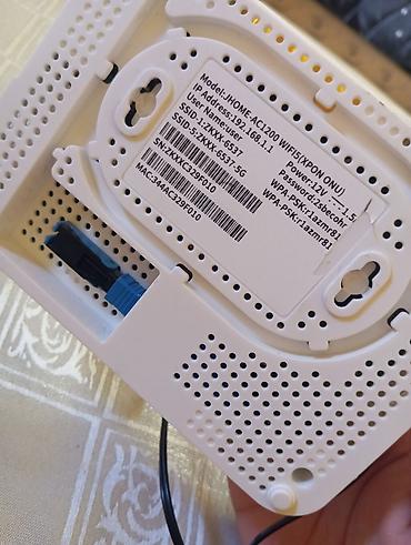 router qiymetleri: İki ədəd Wi‑Fi marşrutizator və adapterləri.Razilasma yolu ilə Təcili — 4