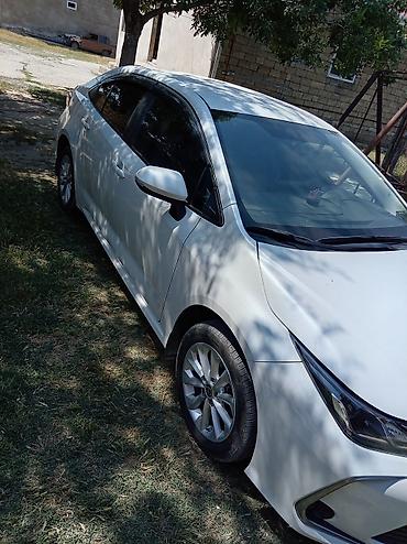 opel disk r16: Toyota Corolla sedan - Kuzov: sedan, ağ rəng - Mühərrik və ötürmə — 5