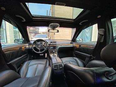 mercedes sekilleri: Mercedes-Benz E‑Class (W211) sedan – qara rəng, AMG üslublu eksteryer — 6