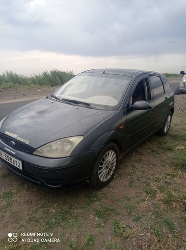 опель вектора с: Хэтчбек Ford Focus первого поколения, представленный в темном цвете