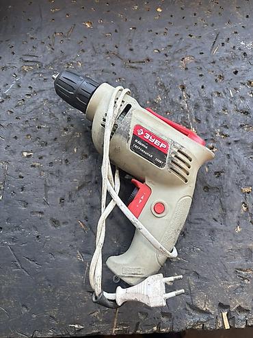 drel tutacağı: ZUBR elektrikli dəlikdelən (şnurla) - Güc: 550 Vt (korpus üzərində — 1