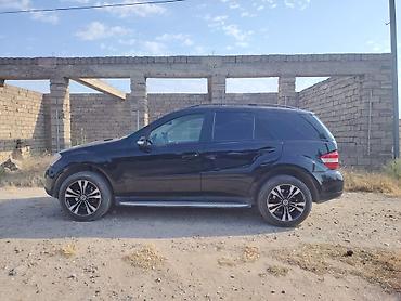 ag 07 sekilleri: Mercedes-Benz ML-Class (W164) SUV Xüsusiyyətlər: - Kuzov: 5 qapılı — 2