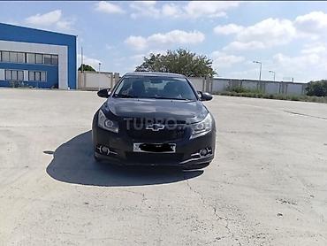 kia rio 2007: Chevrolet Cruze: 1.6 l | 2010 il 197965 km Sedan — 1