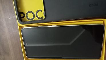 11 telefon: Poco M7 Pro 5G, 256 GB, rəng - Gümüşü, Face ID, Barmaq izi — 2