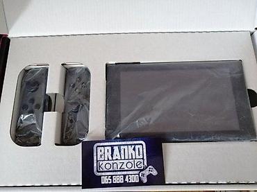 Nintendo Switch: 🔥 JEDINSTVENA PONUDA! Prodajem Nintendo Switch 32GB + microSD 400GB — 5