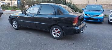 sukanlar: Daewoo Lanos: 1.5 l | 2011 il Sedan — 9