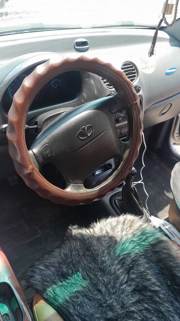 меняю на недвижимость: Компактный городской автомобиль Daewoo Matiz серебристого цвета с