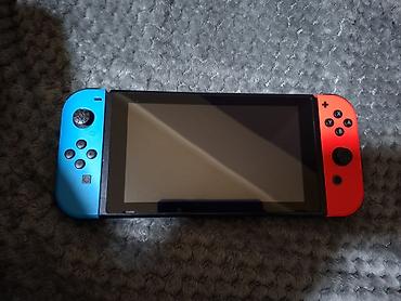 oled smart tv: Nintendo Switch konzola sa originalnim Joy-Con kontrolerima u — 2