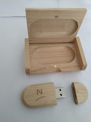e book: Деревянная USB-флешка Novotel Bishkek City Center с фирменной — 2