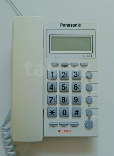 saç qırxan maşın: Stasionar telefon Panasonic, Simli, İşlənmiş, Ünvandan götürmə