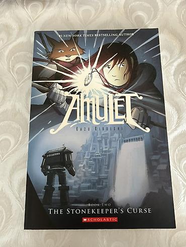 Книги и журналы: Məhsul: Amulet – The Stonekeeper’s Curse (Book Two) ingilis dilinde — 1