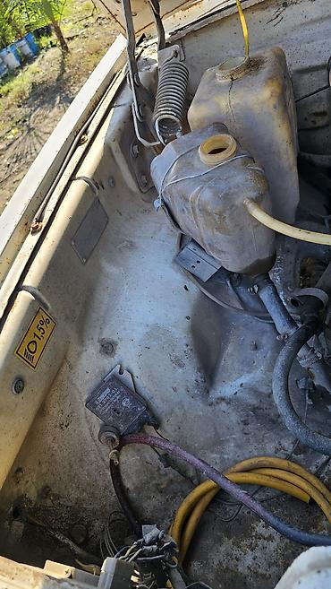 QAZ: QAZ 3110: 2.4 l | 1998 il Sedan — 10