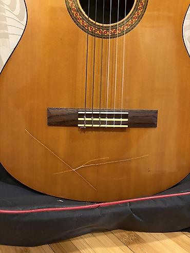 Gitaralar: Klassik gitara, Yamaha, İşlənmiş, Ünvandan götürmə — 2