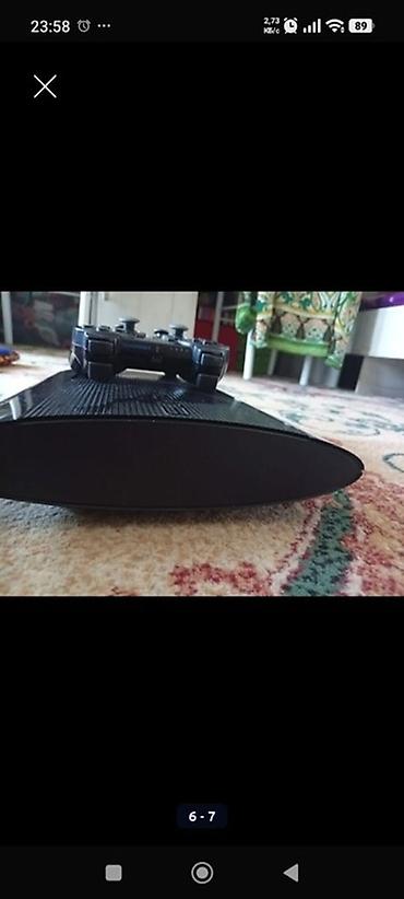 рии: Игровая приставка Sony PlayStation 3 Super Slim с двумя беспроводными — 5
