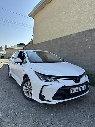 byd e2 2021: Toyota Corolla: 2021 г., 1.8 л, Вариатор, Гибрид, Седан — 1