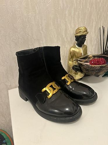 Сапоги: 40 razmer,2 defe geyinilib,teze kimidir,20 azn — 1