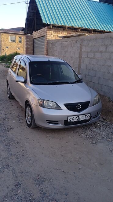 Mazda: Мазда Демио объём 1.3