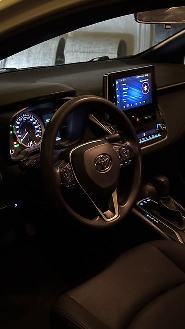 электра машына: Toyota Corolla: 2019 г., 1.8 л, Гибрид, Седан — 7