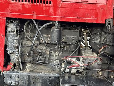 Другие тракторы: Трактор колесный красного цвета с кабиной. Основные характеристики и — 1