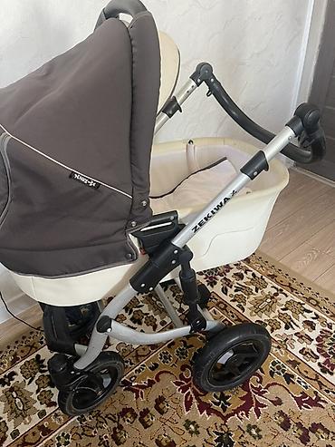 Коляски: Детская коляска Zekiwa (универсальная 2-в-1). Комплектация: - Люлька — 3