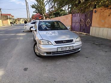 opel təkərləri: Opel Astra G sedan – gümüşü rəng Texniki xüsusiyyətlər: - Kuzov: 4 — 1