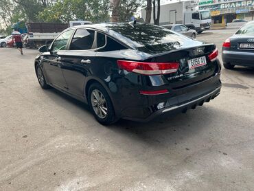 машиналар: Элегантный черный седан Kia Optima с динамичным дизайном. Автомобиль