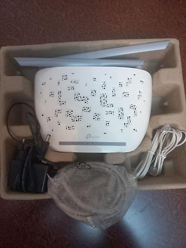 cat 5 kabel: TP-Link simsiz router və ADSL/VDSL modem kombosu Xüsusiyyətlər: - İki — 2