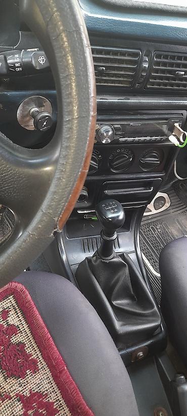 Daewoo: Daewoo Racer sedan - Kuzov: 4 qapılı sedan, tünd mavi rəng - Mator və — 9