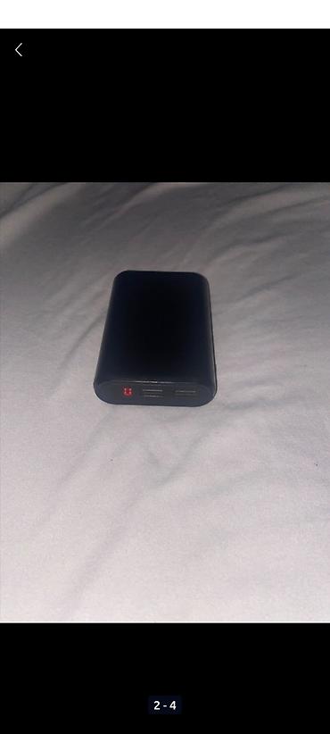 Техника и электроника: Портативный внешний аккумулятор (power bank) в черном цвете — 1
