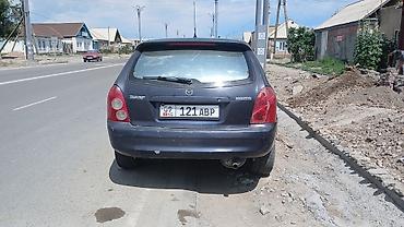 форт грзовой: Mazda 323: 2002 г., 1.6 л, Механика, Бензин, Хэтчбэк — 4