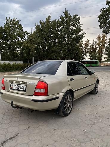 Mazda: Mazda 323: 1998 г., 1.5 л, Механика, Бензин, Седан — 13