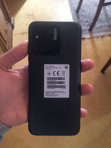 telefon qutusu: Xiaomi Redmi 10A, 64 GB, rəng - Qara, 
 Barmaq izi, İki sim kartlı, Face ID