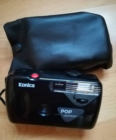 duzi sako: Fotoaparat Konica sa futrolom, "pop junior", dimenzije 12x7 cm, ne