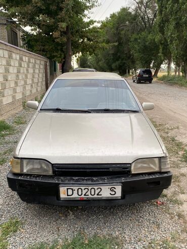 россия номер машина: Mazda 323: 1989 г., 1.3 л, Механика, Бензин, Хэтчбэк