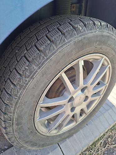 low ll: Mazda Demio: 2003 г., Автомат — 7