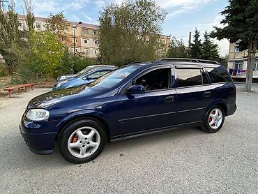 opel astra 94: Opel Astra: 1.6 l | 1999 il 125688 km Universal — 6