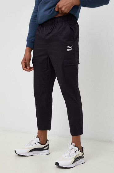 спортивные брюки мужские хлопок: Чёрные брюки-карго от Puma. Свободный крой, укороченная длина и