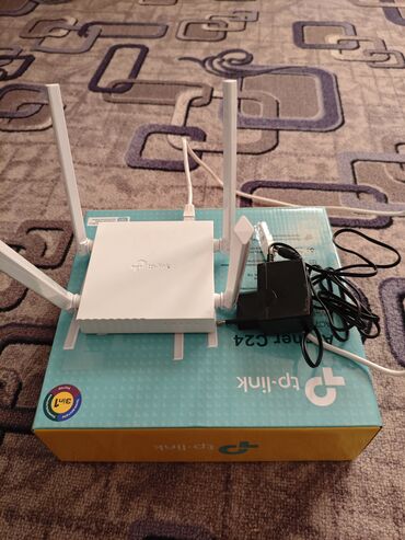 вай фай роутер мегаком отзывы: Белый роутер TP-Link Archer C24 с четырьмя антеннами, обеспечивающий